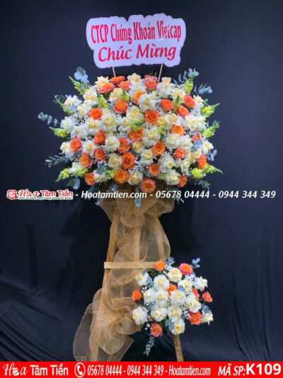 Kệ hoa khai trương tông cam pastel nhẹ