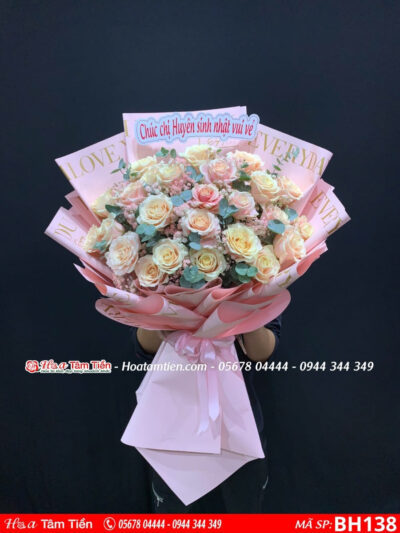 bó hoa hồng mondial mix baby và lá bạc gói giáy hồng