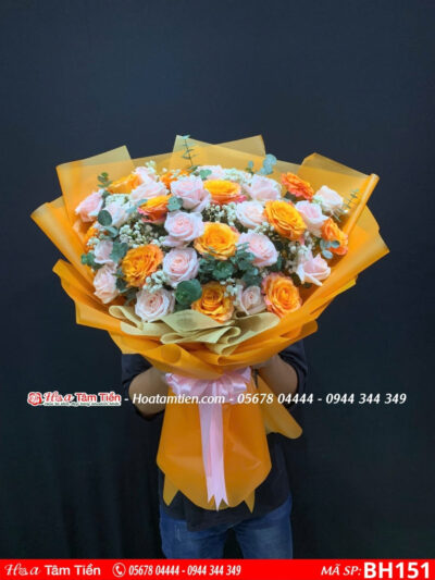 Bó hoa hồng cam spirit mix hồng pastell gói giấy cam tại hoa tâm tiền