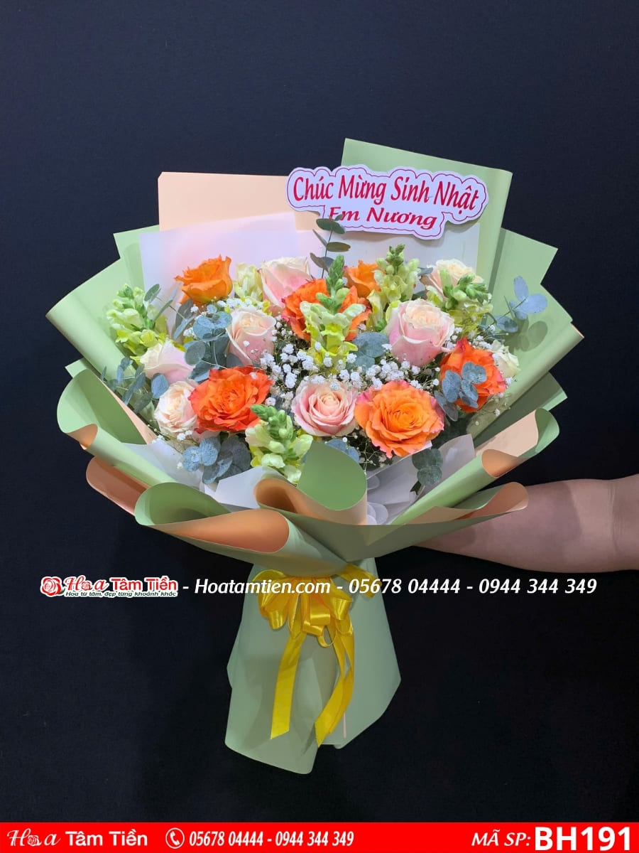 bó hoa hồng cam mix hoa mõm sói gói giấy xanh lá