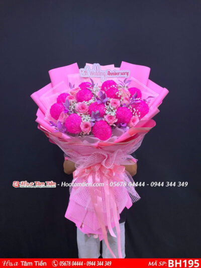 bó hoa cúc mẫu đơn mix hoa hồng lạc thần gói giấy hồng