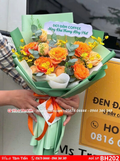 bó hoa hồng cam mix hoa lan vũ nữ gói giây xanh