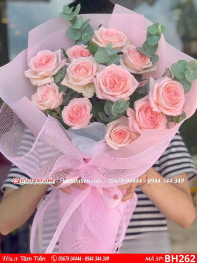 Bó hoa ohara hồng 11 bông mix lá bạc gói giấy hồng sen