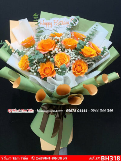 bó hoa hồng cam phối với lá bạc và baby trắng gói giấy xanh
